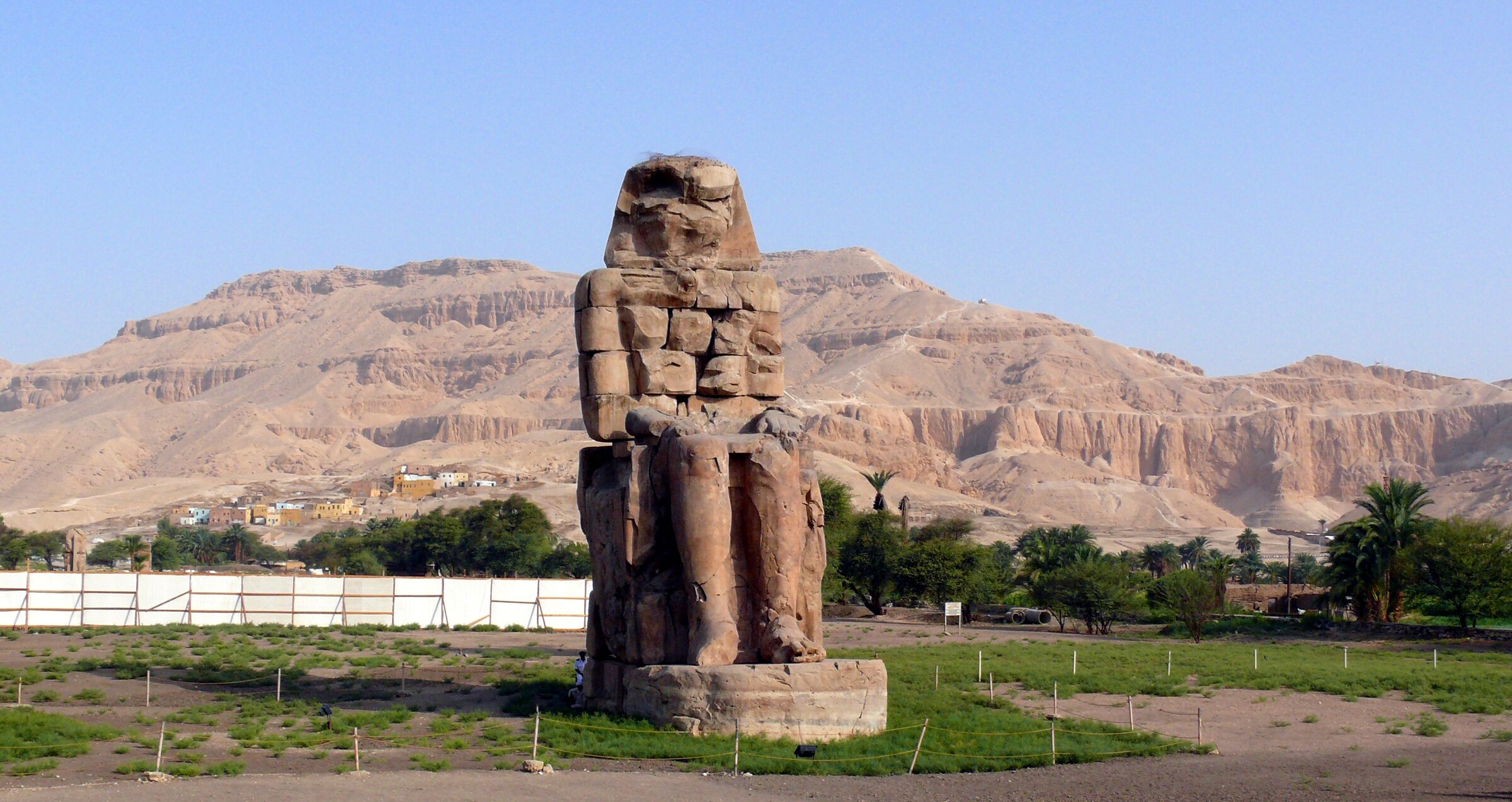 Colossi of Memnon — twin seated statues of Amenhotep III on the Theban Necropolis, Luxor